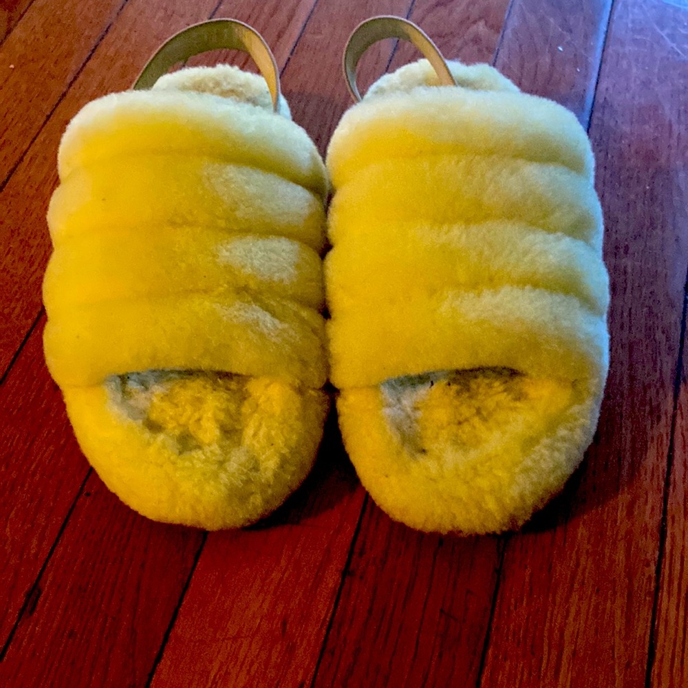 This are a pair of yellow uggs in good condition these are a four in USA.